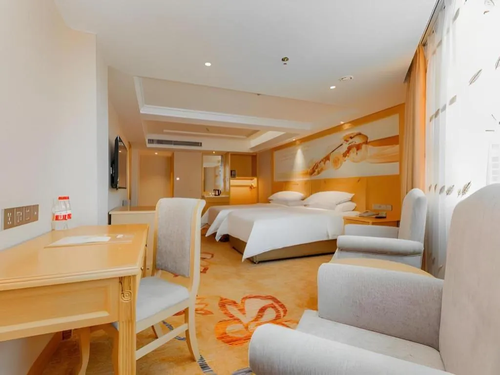 Bed in Vienna Hotel Guangxi Hezhou Guposhan Suifeng