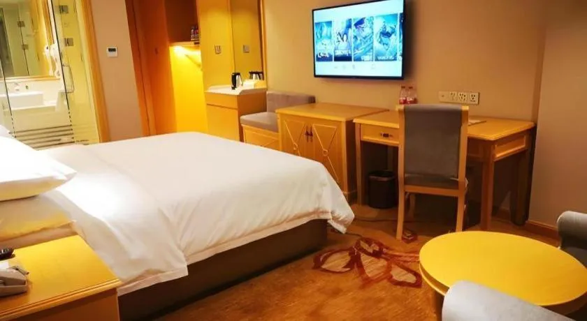 Bed in Vienna Hotel Guangxi Hezhou Guposhan Suifeng