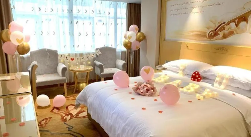 Bed in Vienna Hotel Guangxi Hezhou Guposhan Suifeng