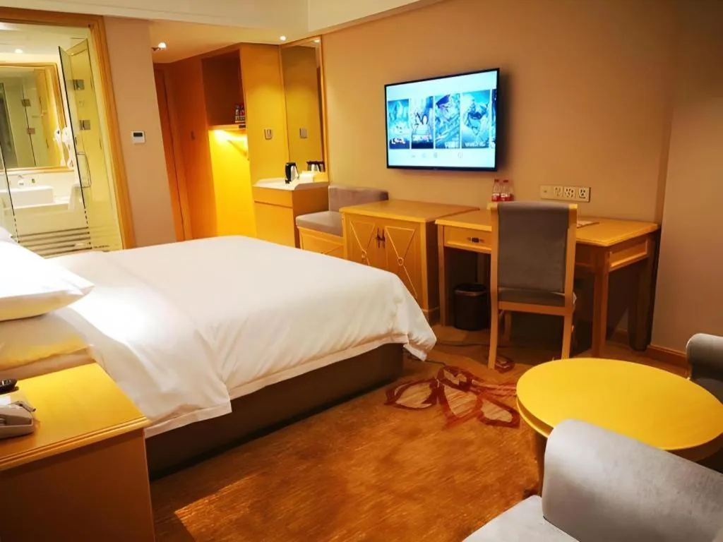 Bed in Vienna Hotel Guangxi Hezhou Guposhan Suifeng