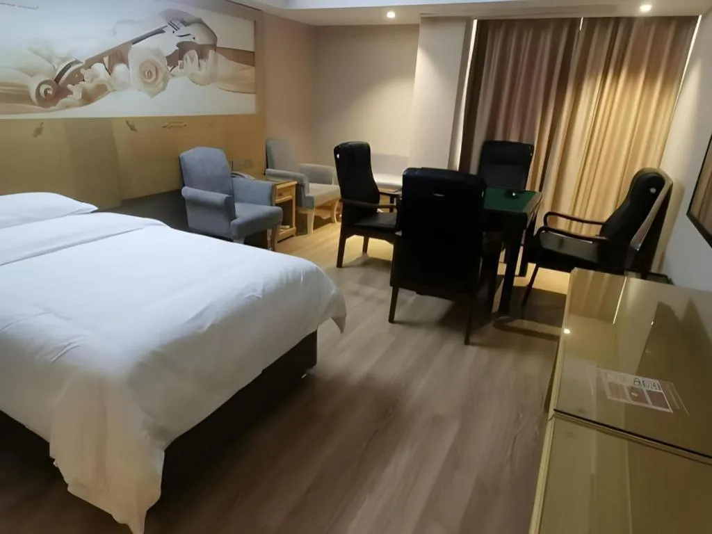 Bed in Vienna Hotel Guangxi Hezhou Guposhan Suifeng