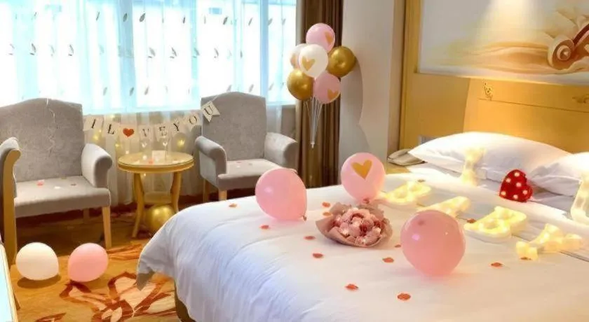 Bed in Vienna Hotel Guangxi Hezhou Guposhan Suifeng