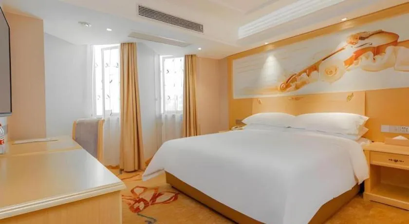 Bed in Vienna Hotel Guangxi Hezhou Guposhan Suifeng