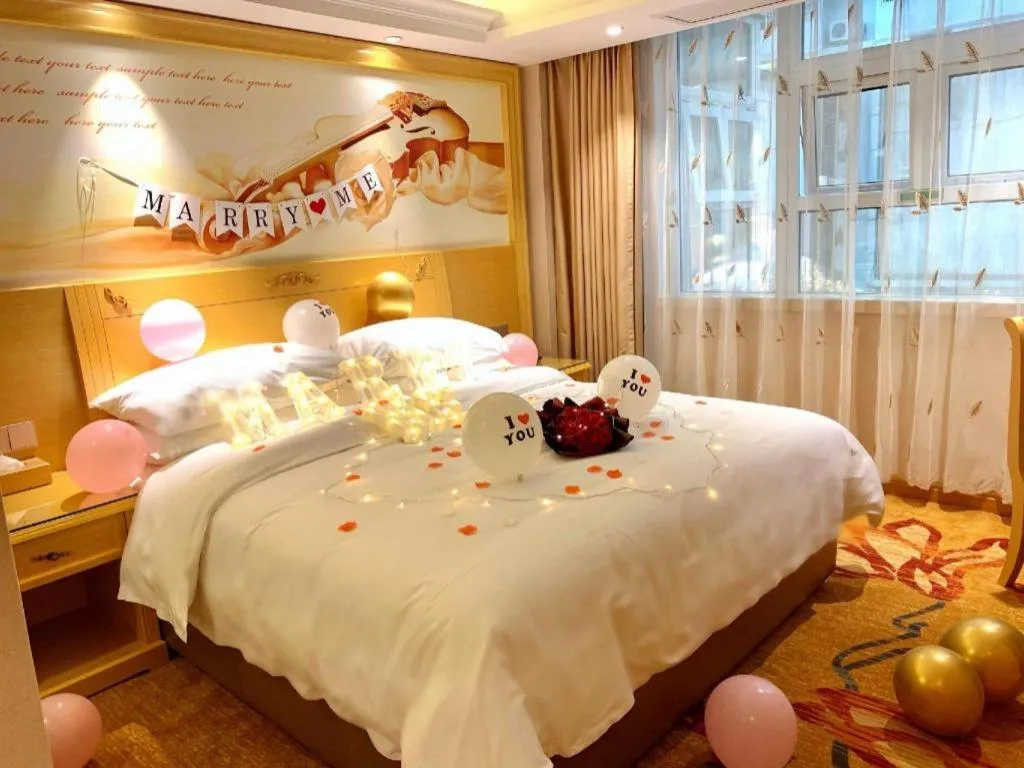 Bed in Vienna Hotel Guangxi Hezhou Guposhan Suifeng