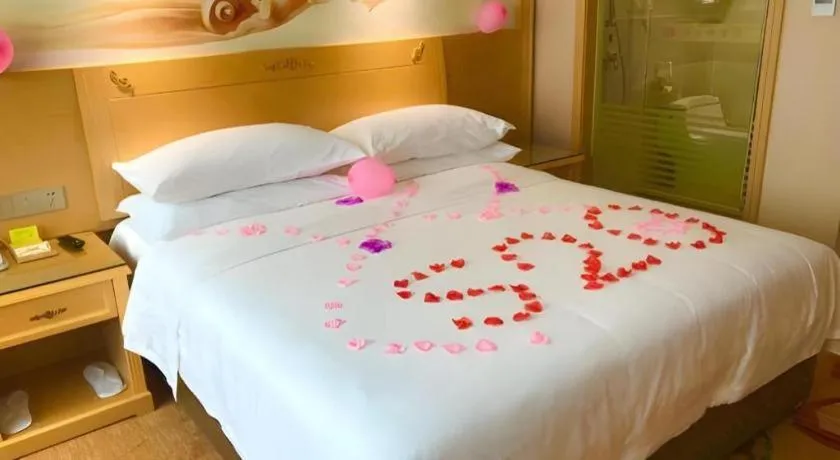 Bed in Vienna Hotel Guangxi Hezhou Guposhan Suifeng