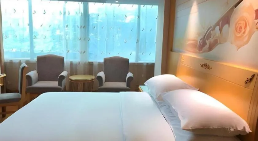 Bed in Vienna Hotel Guangxi Hezhou Guposhan Suifeng