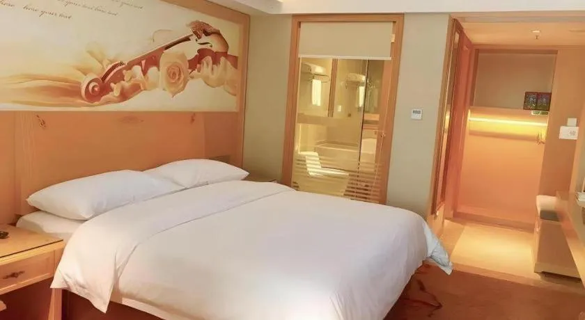 Bed in Vienna Hotel Guangxi Hezhou Guposhan Suifeng