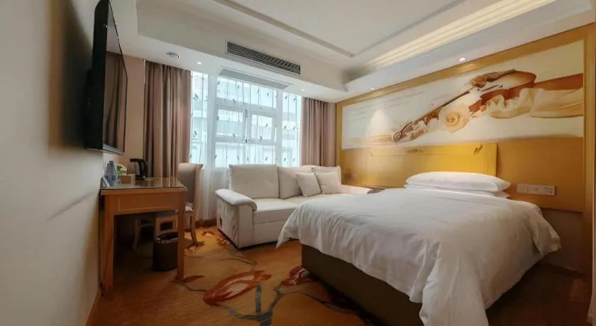 Bed in Vienna Hotel Guangxi Hezhou Guposhan Suifeng