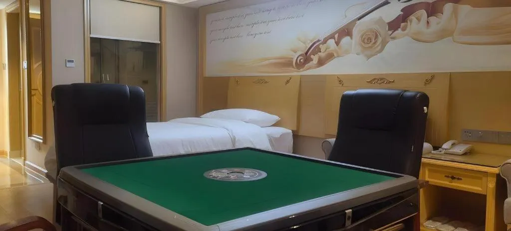 Bed in Vienna Hotel Guangxi Hezhou Guposhan Suifeng