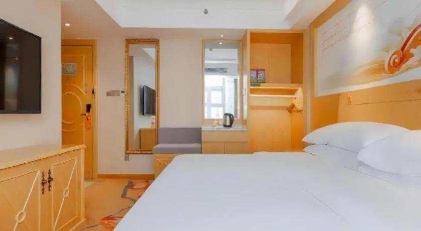 Bed in Vienna Hotel Guangxi Hezhou Guposhan Suifeng