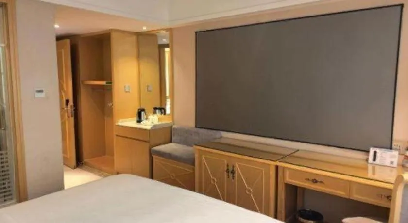 Bed in Vienna Hotel Guangxi Hezhou Guposhan Suifeng