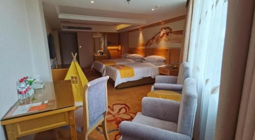 Bed in Vienna Hotel Guangxi Hezhou Guposhan Suifeng