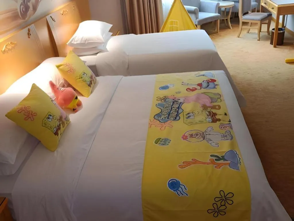 Bed in Vienna Hotel Guangxi Hezhou Guposhan Suifeng