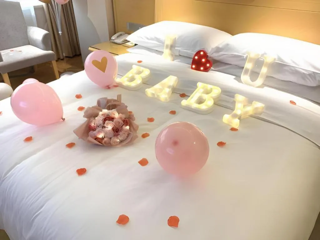 Bed in Vienna Hotel Guangxi Hezhou Guposhan Suifeng