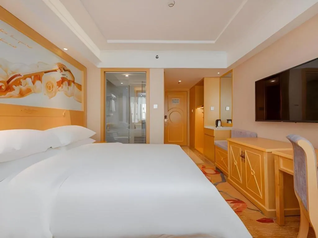 Bed in Vienna Hotel Guangxi Hezhou Guposhan Suifeng