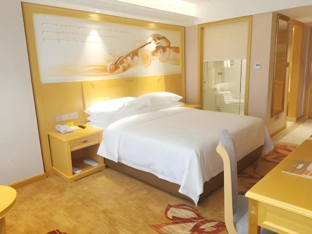Bed in Vienna Hotel Guangxi Hezhou Guposhan Suifeng