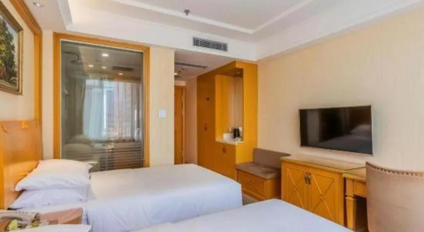 Bed in Vienna Hotel Shenyang Central Street