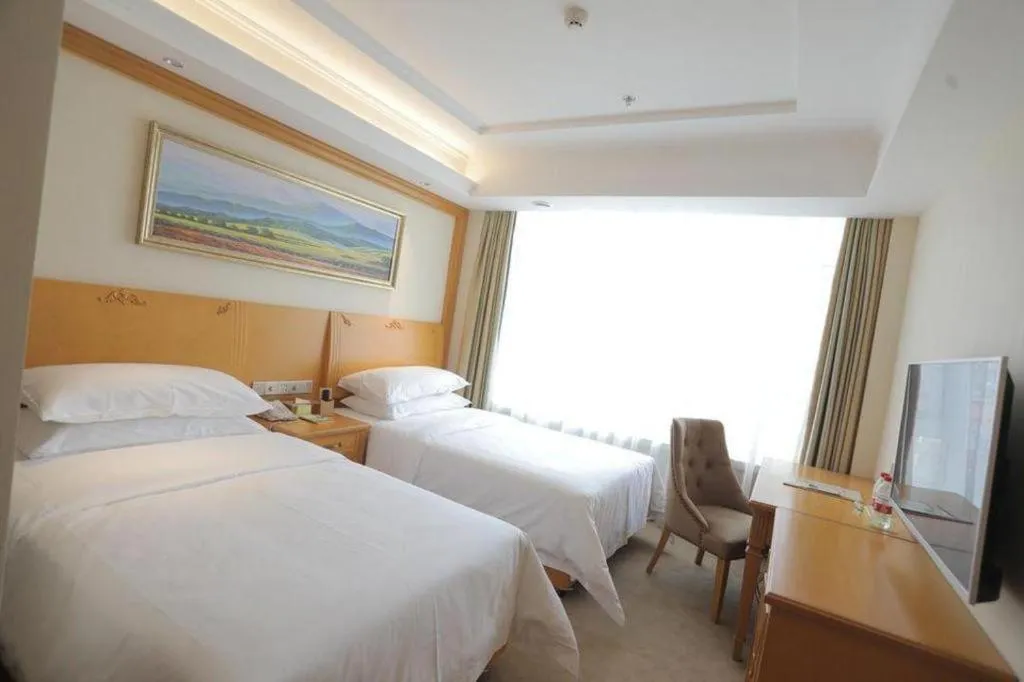 Bed in Vienna Hotel Shenyang Central Street