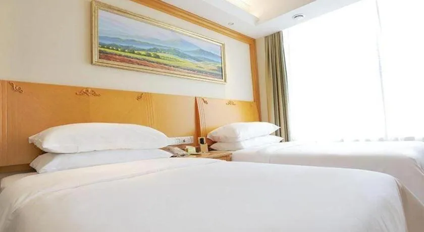 Bed in Vienna Hotel Shenyang Central Street