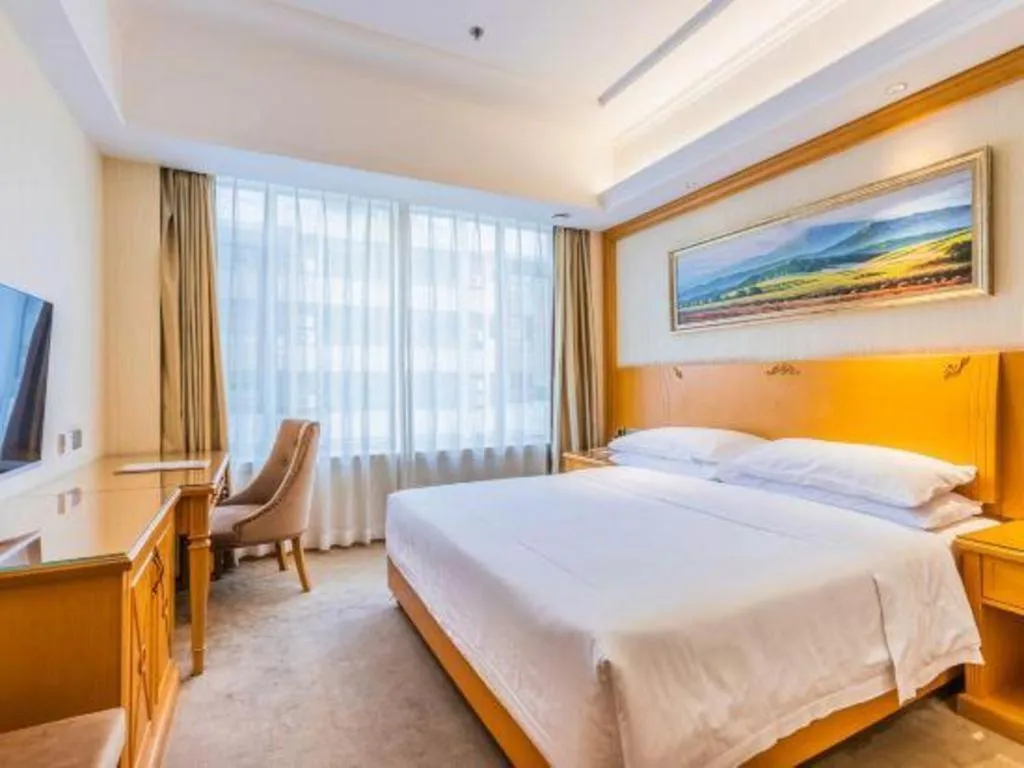 Bed in Vienna Hotel Shenyang Central Street