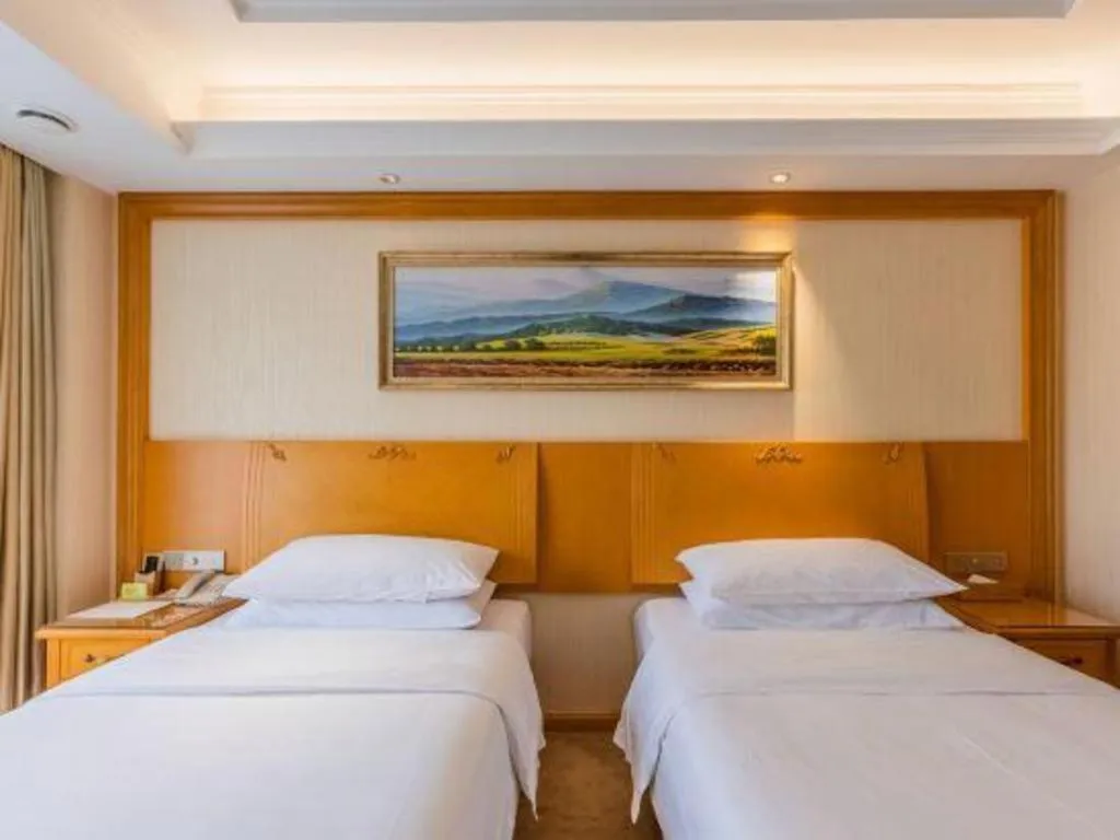 Bed in Vienna Hotel Shenyang Central Street
