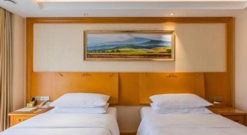 Bed in Vienna Hotel Shenyang Central Street