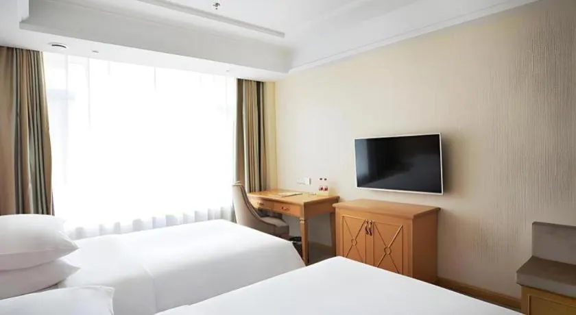 Bed in Vienna Hotel Shenyang Central Street