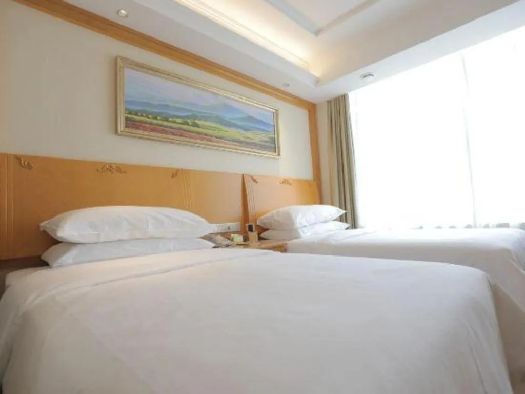 Bed in Vienna Hotel Shenyang Central Street