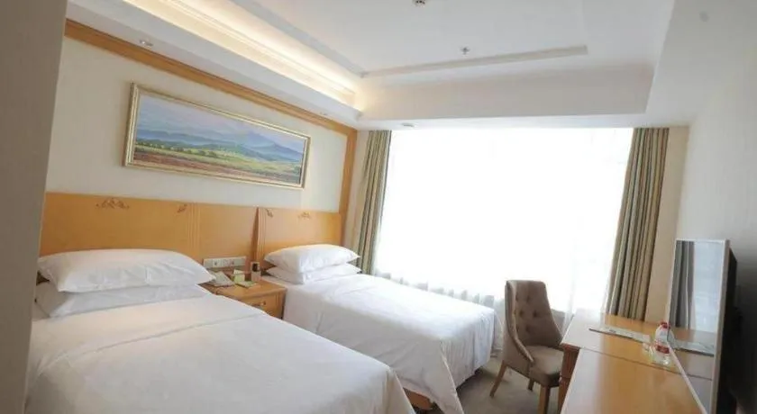 Bed in Vienna Hotel Shenyang Central Street