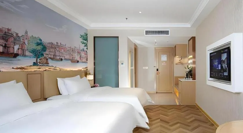 Bed in Vienna Hotel Guiyang Yunyan District Government