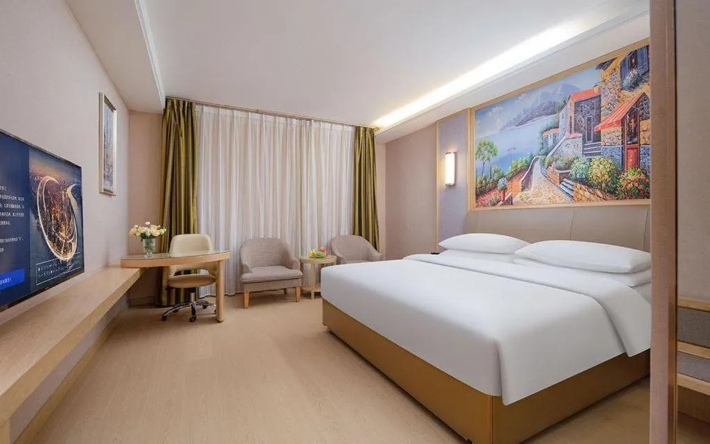 Bed in Vienna Hotel Guizhou Liupanshui Shuicheng Ancient Town