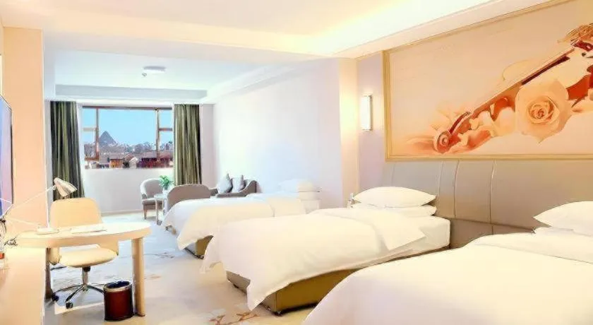 Bed in Vienna Hotel Guizhou Liupanshui Shuicheng Ancient Town