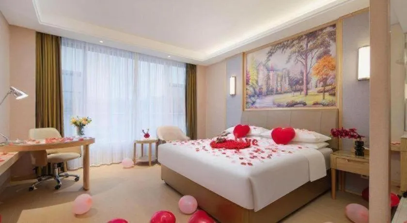 Bed in Vienna Hotel Guizhou Liupanshui Shuicheng Ancient Town