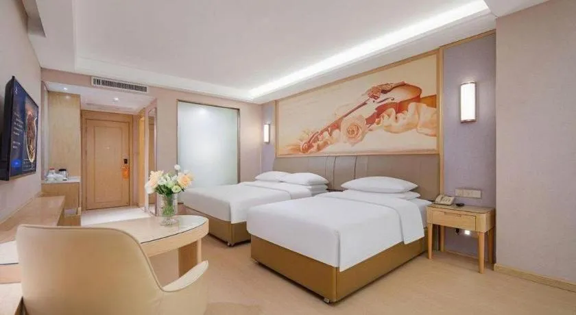 Bed in Vienna Hotel Guizhou Liupanshui Shuicheng Ancient Town