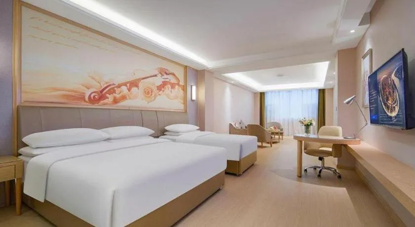 Bed in Vienna Hotel Guizhou Liupanshui Shuicheng Ancient Town