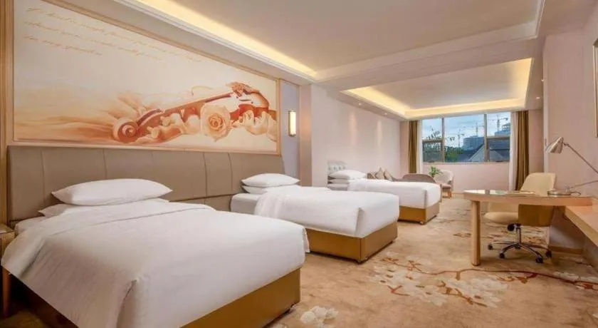 Bed in Vienna Hotel Guizhou Liupanshui Shuicheng Ancient Town