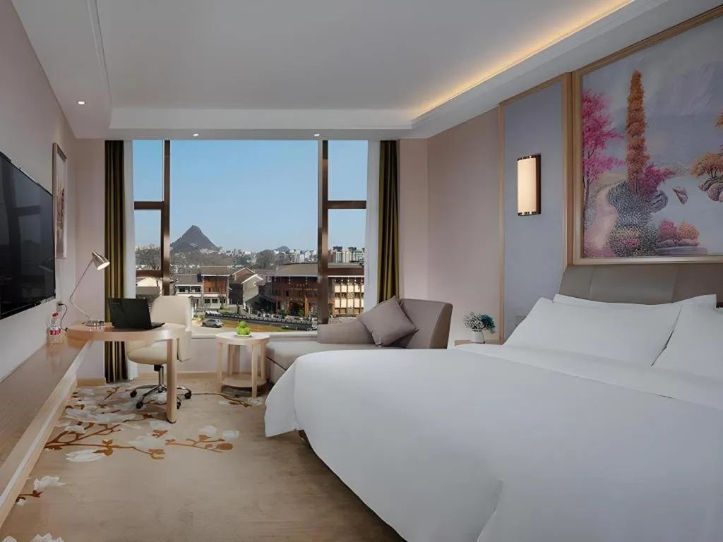 Bed in Vienna Hotel Guizhou Liupanshui Shuicheng Ancient Town