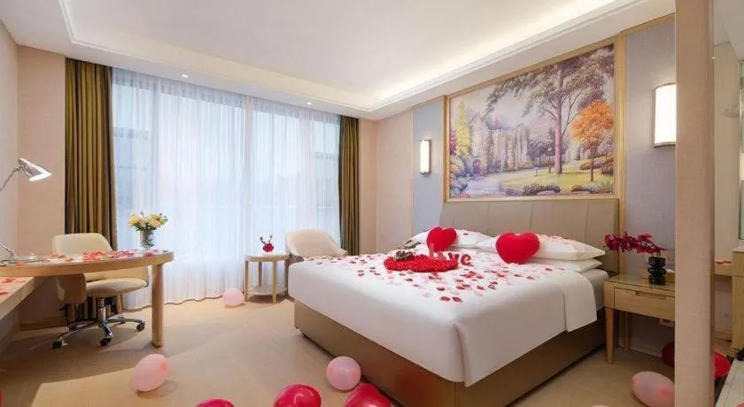 Bed in Vienna Hotel Guizhou Liupanshui Shuicheng Ancient Town