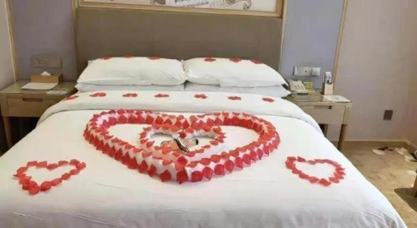 Bed in Vienna Hotel Guizhou Liupanshui Shuicheng Ancient Town