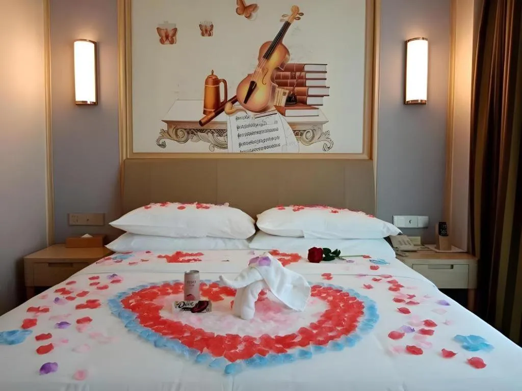 Bed in Vienna Hotel Guizhou Liupanshui Shuicheng Ancient Town