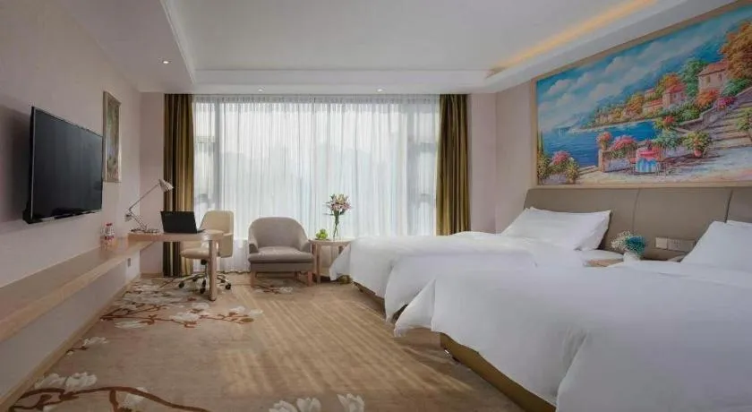 Bed in Vienna Hotel Guizhou Liupanshui Shuicheng Ancient Town