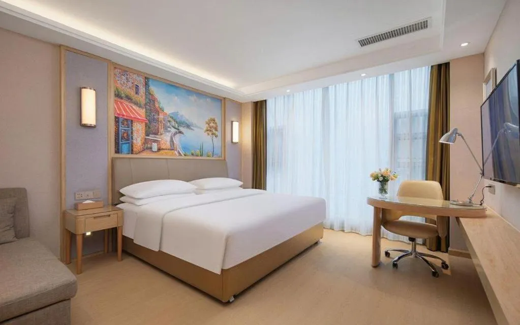 Bed in Vienna Hotel Guizhou Liupanshui Shuicheng Ancient Town