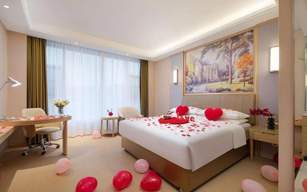 Bed in Vienna Hotel Guizhou Liupanshui Shuicheng Ancient Town