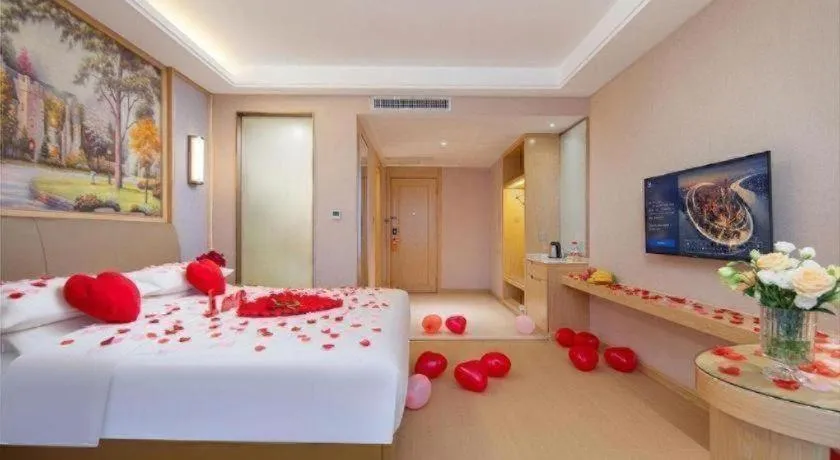 Bed in Vienna Hotel Guizhou Liupanshui Shuicheng Ancient Town