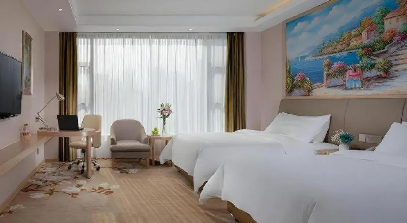 Bed in Vienna Hotel Guizhou Liupanshui Shuicheng Ancient Town