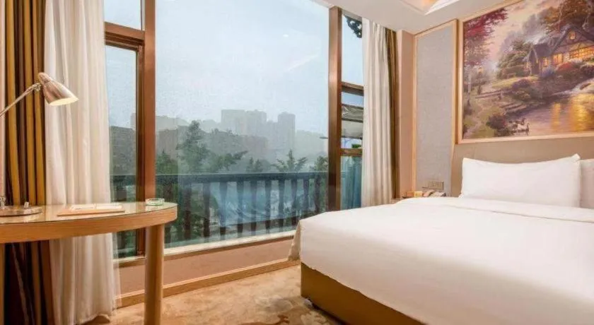 Bed in Vienna Hotel Guizhou Liupanshui Shuicheng Ancient Town