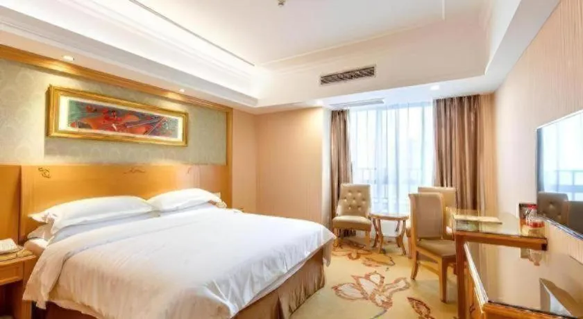 Bed in Vienna Hotel Guangxi Guilin Xing'an