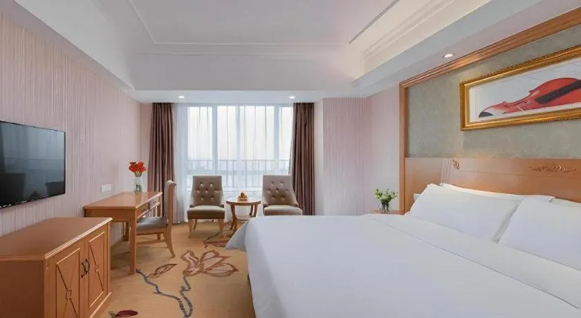 Bed in Vienna Hotel Guangxi Guilin Xing'an