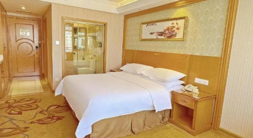 Bed in Vienna Hotel Guangxi Guilin Xing'an