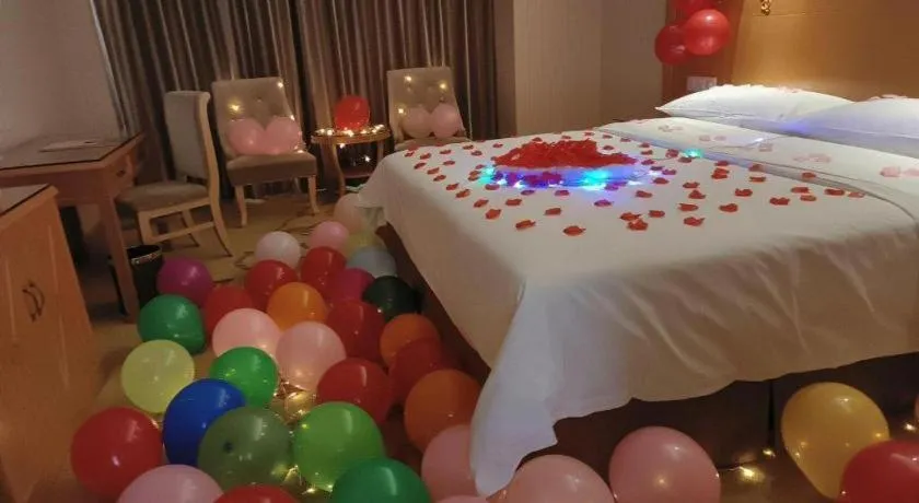 Bed in Vienna Hotel Guangxi Guilin Xing'an